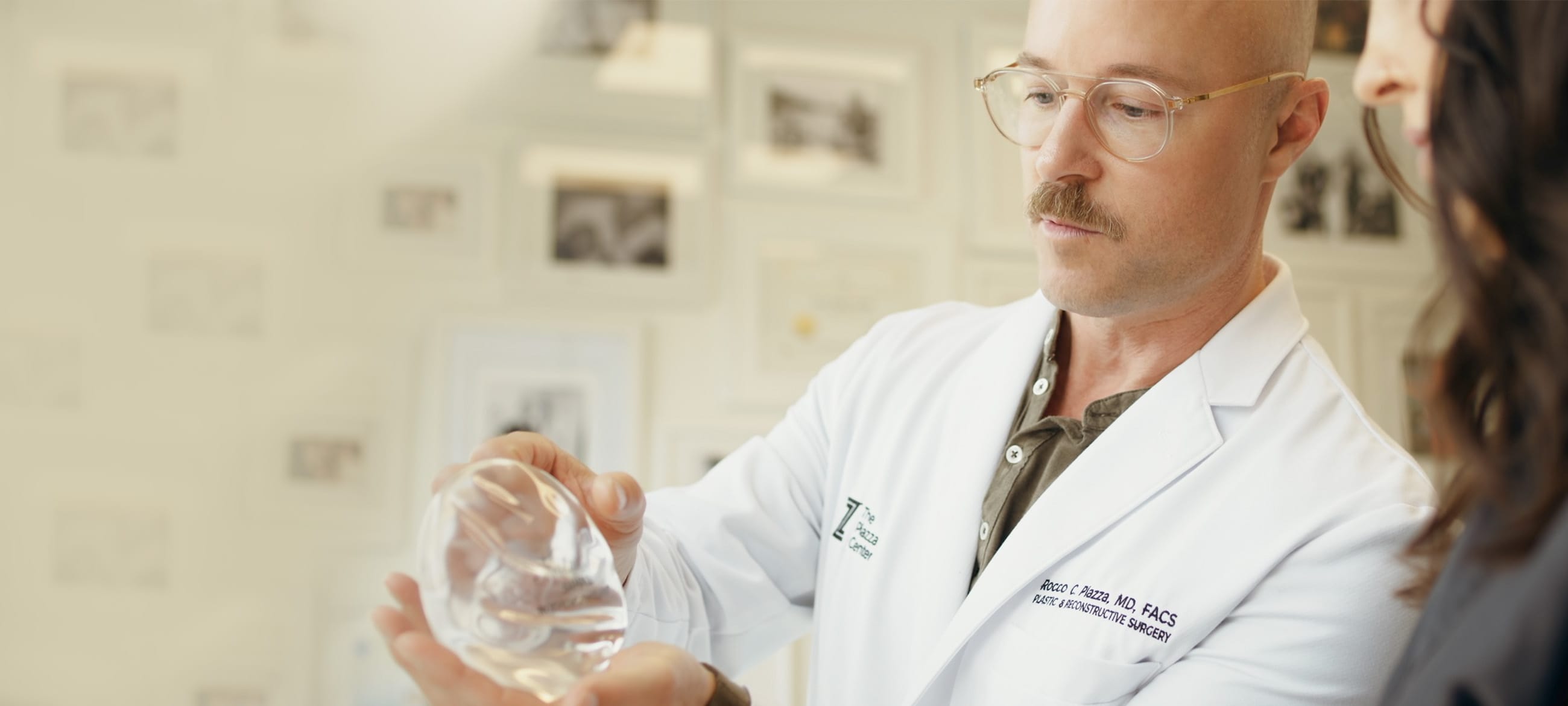 Dr. Rocco Piazza consulting with a patient about Motiva breast implants at The Piazza Center